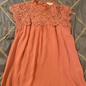 SOLD- Lace accent flows sleeveless top